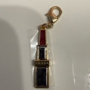 Prada Gold, Red, and Black Lipstick Key Charm keychain